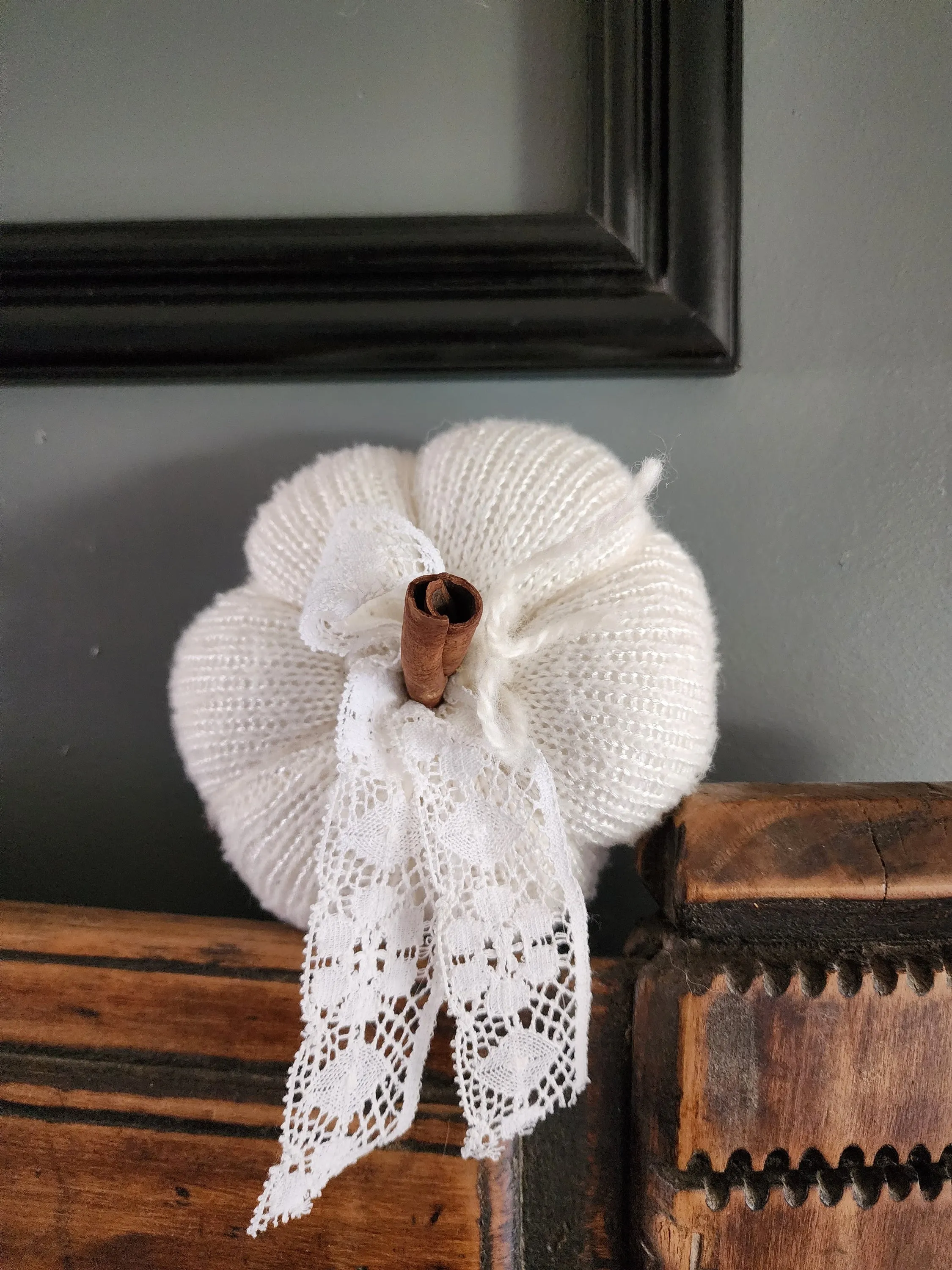 Creamy White Knit Pumpkin PIllow Pouf with Vintage Lace And Cinnamon Stick Stem