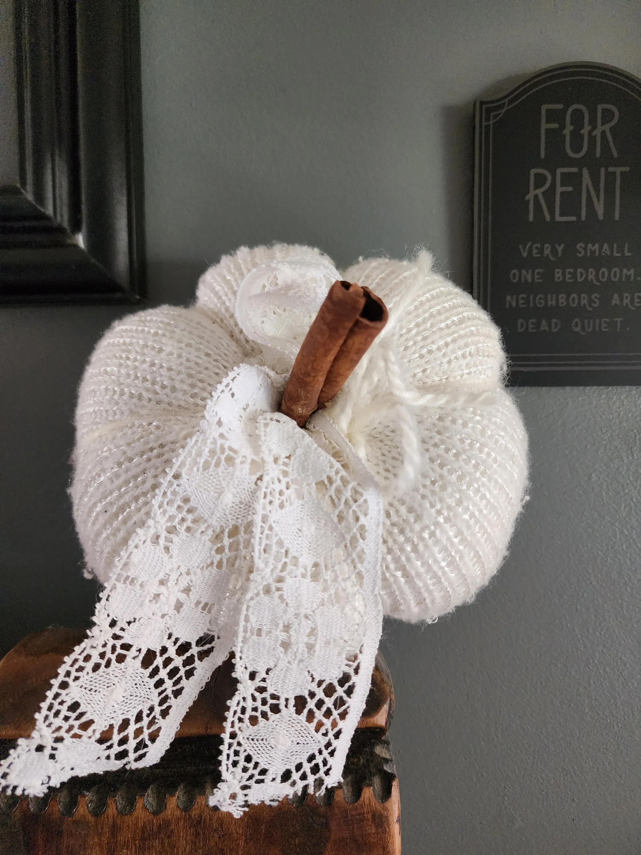 Creamy White Knit Pumpkin PIllow Pouf with Vintage Lace And Cinnamon Stick Stem